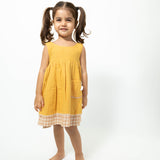 Old photographs sleeveless layered pinafore dress in yellow handwoven cotton