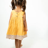 Old photographs sleeveless layered pinafore dress in yellow handwoven cotton